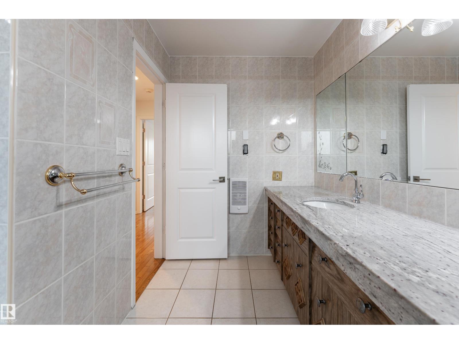 7802 132A AV NW — photo 31