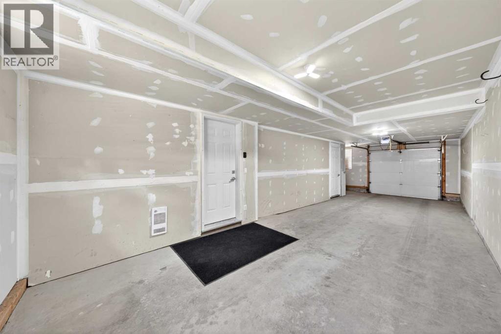 huge double garage with a lot of storage space