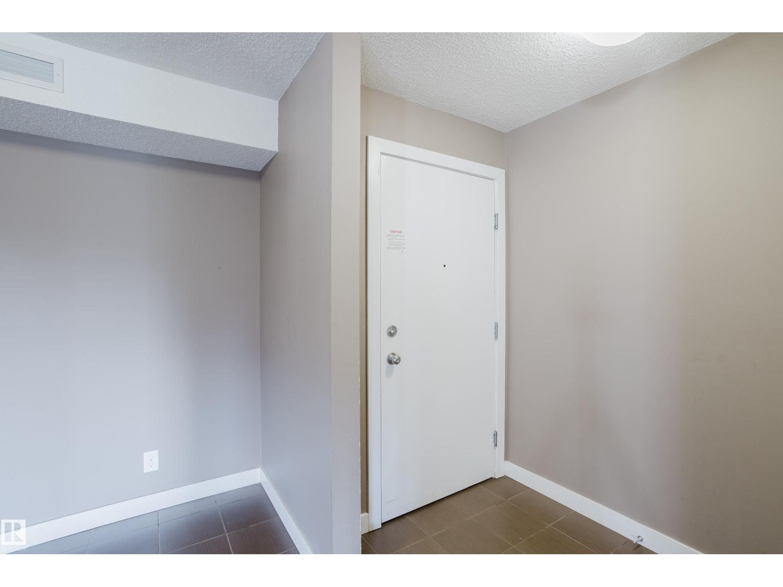 #301 11820 22 AV SW - 10