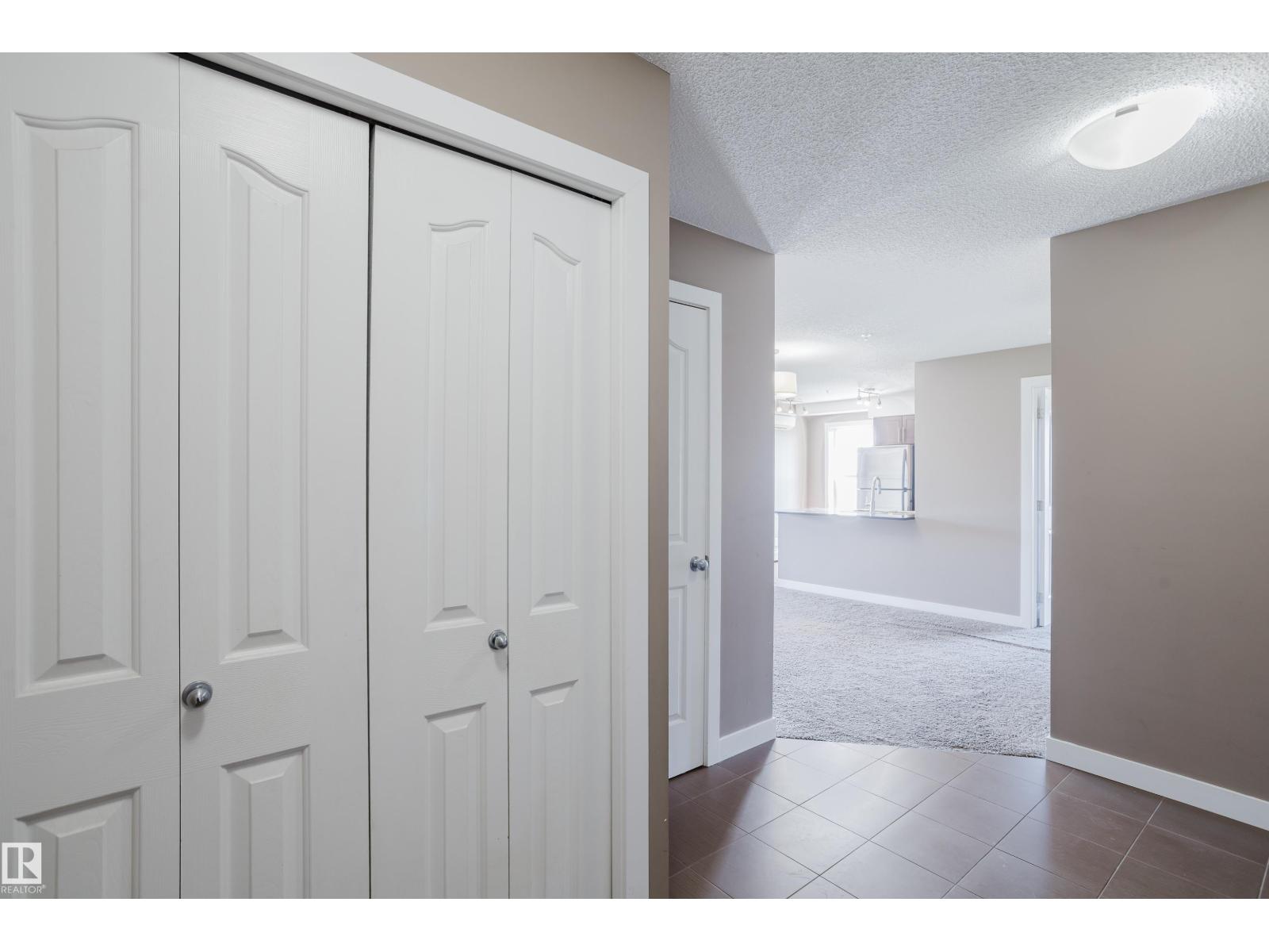 #301 11820 22 AV SW - 11