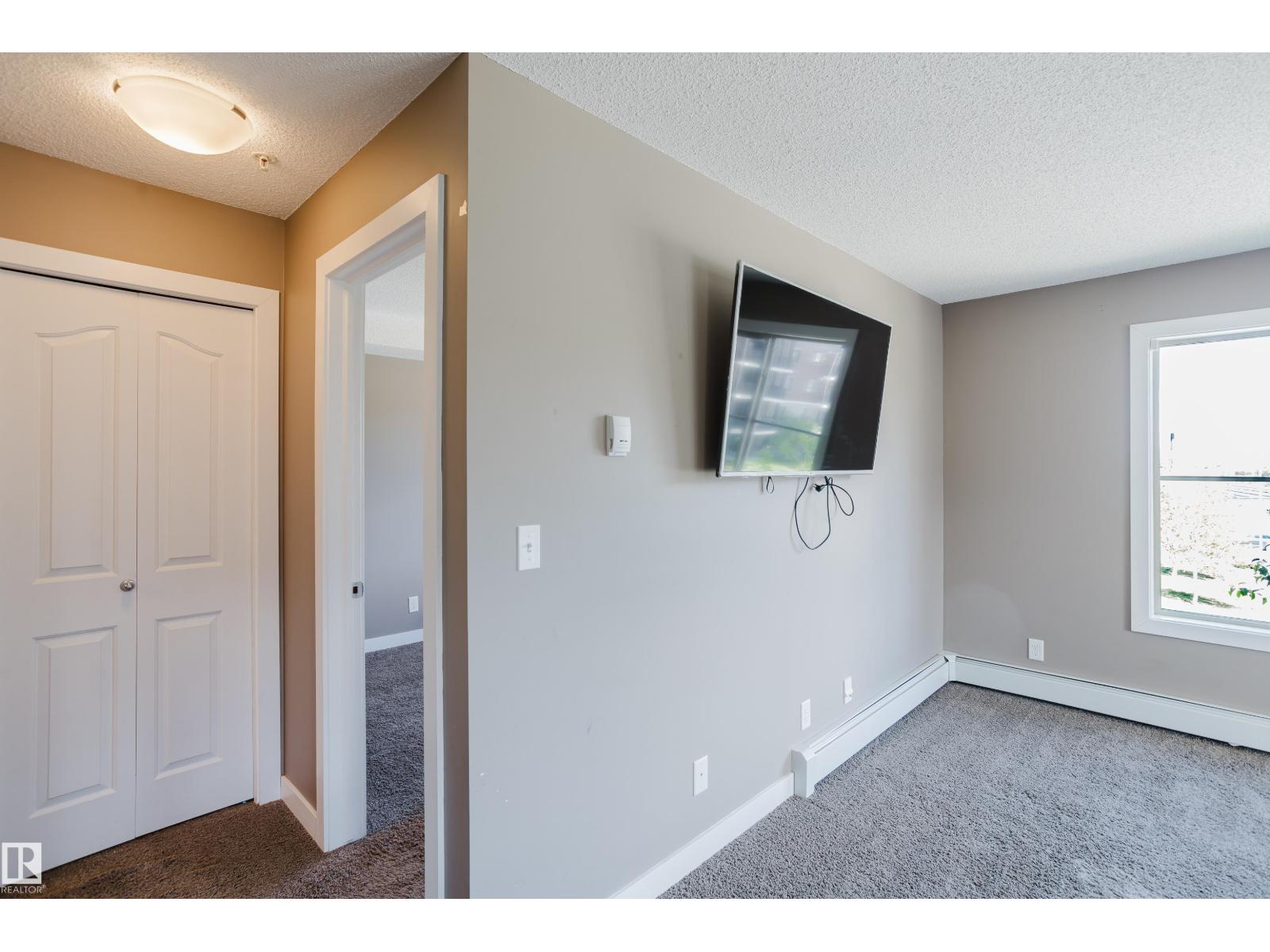 #301 11820 22 AV SW - 18