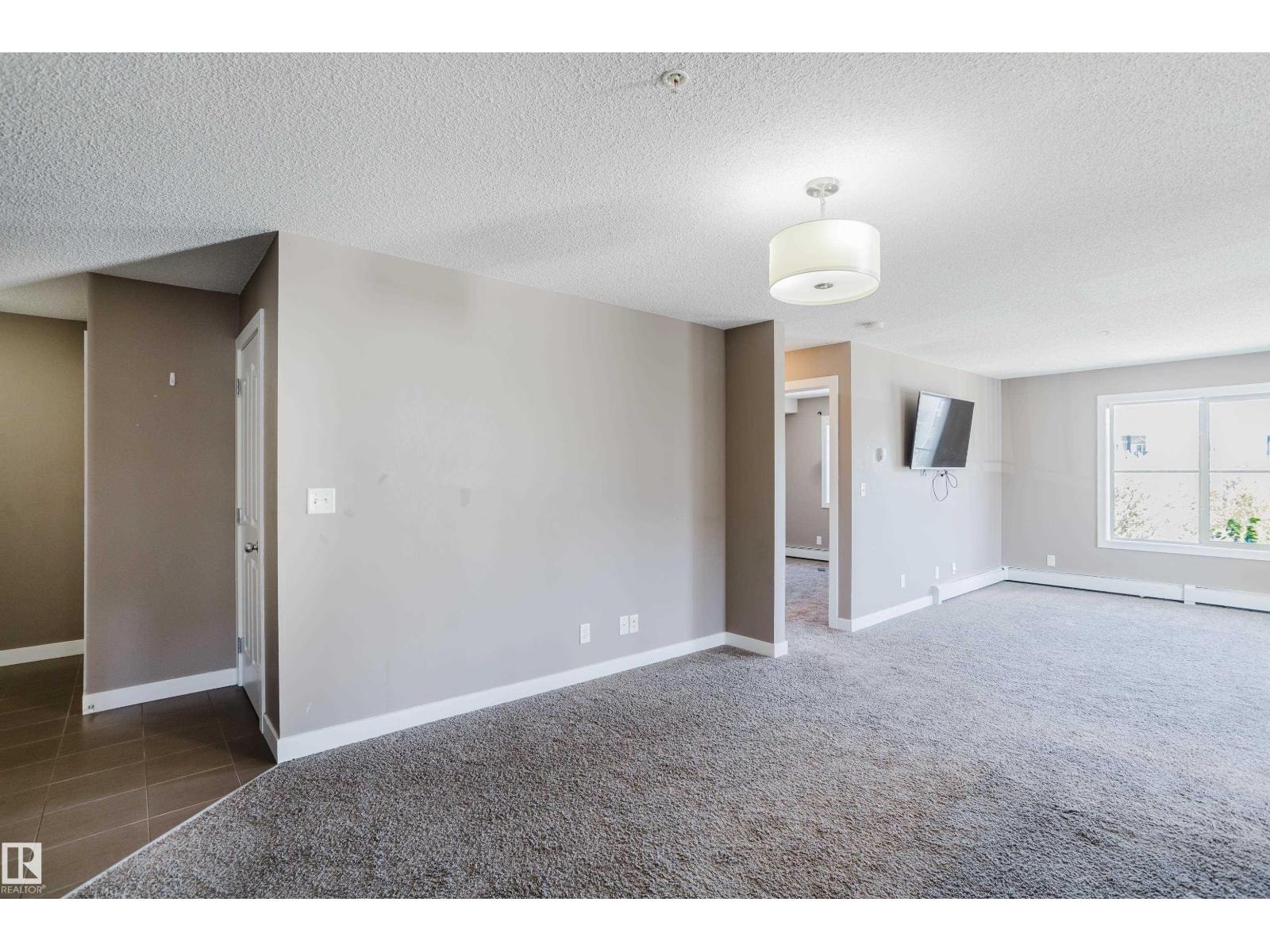 #301 11820 22 AV SW - 2