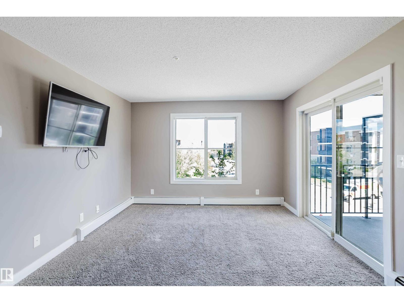 #301 11820 22 AV SW - 24
