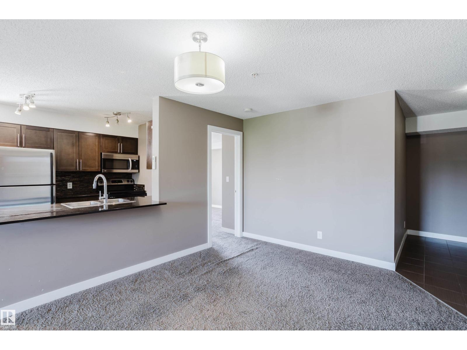 #301 11820 22 AV SW - 3