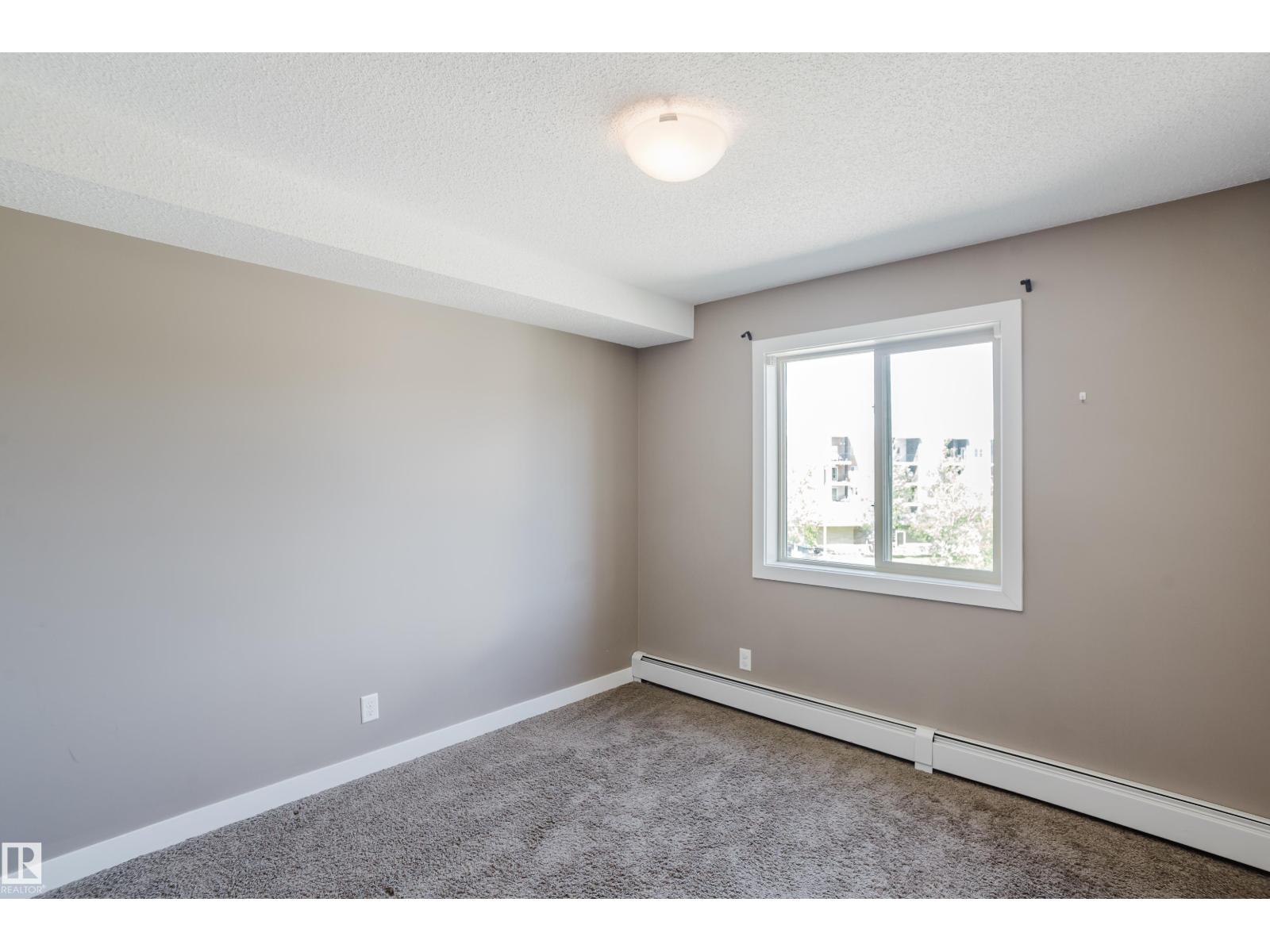 #301 11820 22 AV SW - 40
