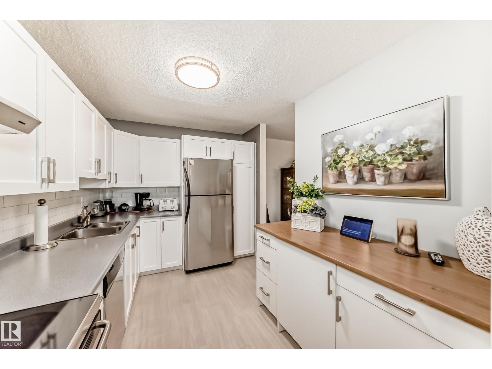 #403 11020 19 AV NW NW - 10