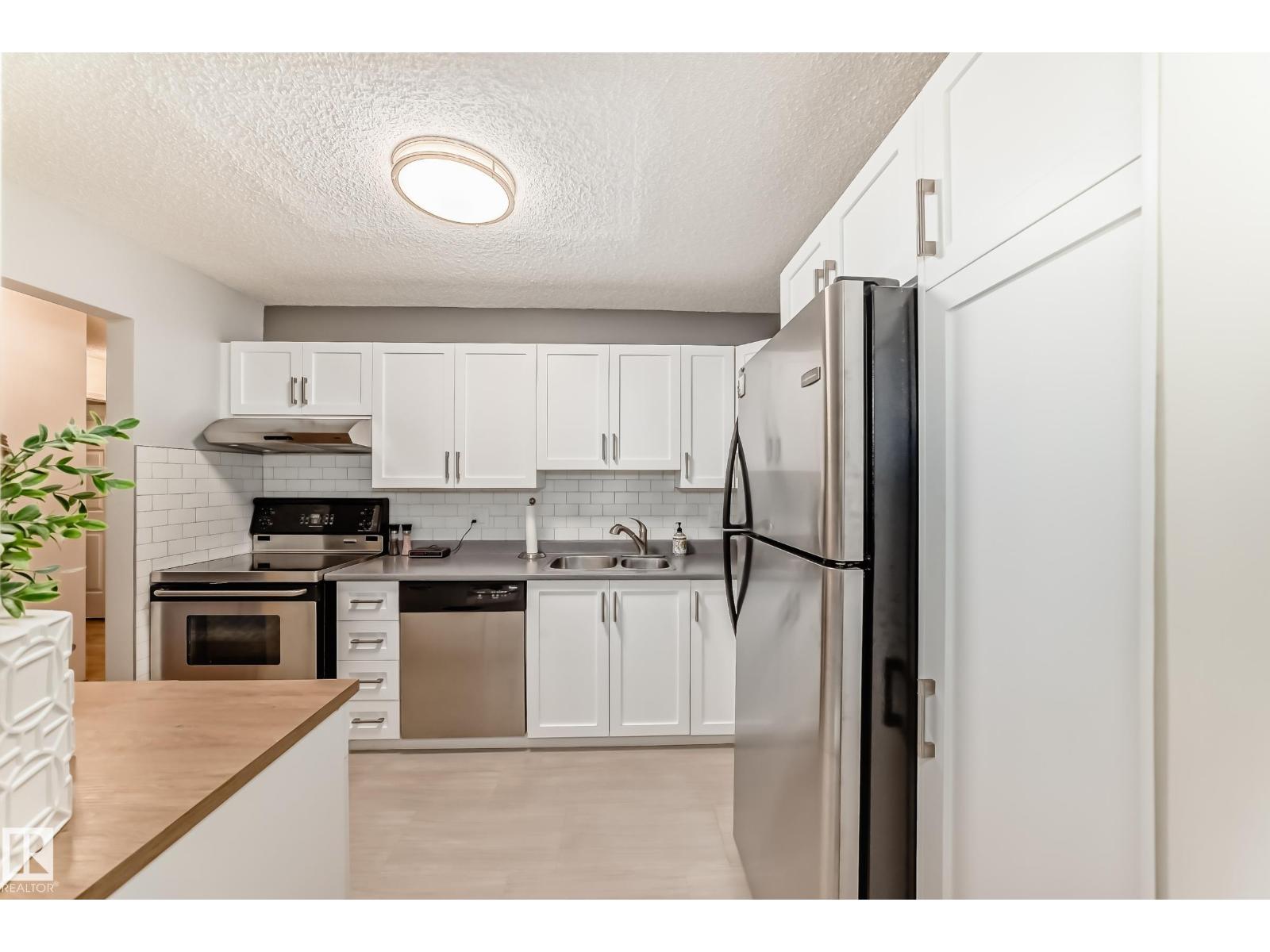 #403 11020 19 AV NW NW - 13