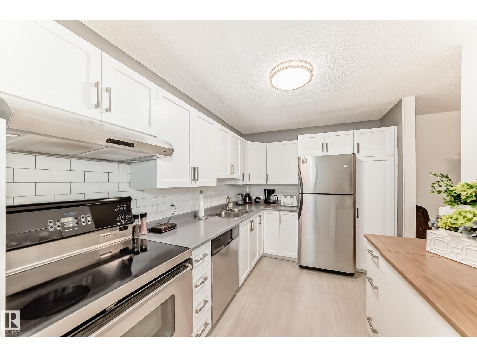 #403 11020 19 AV NW NW - 8