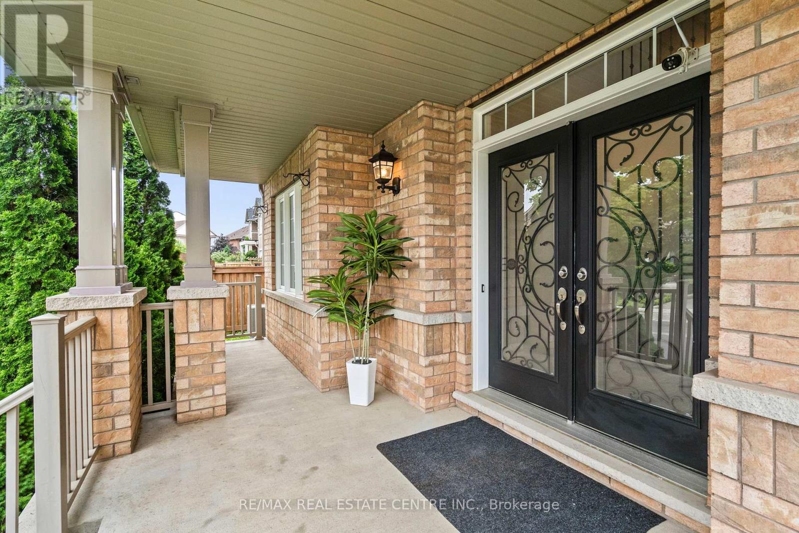 A covered porch with a double-door entry.