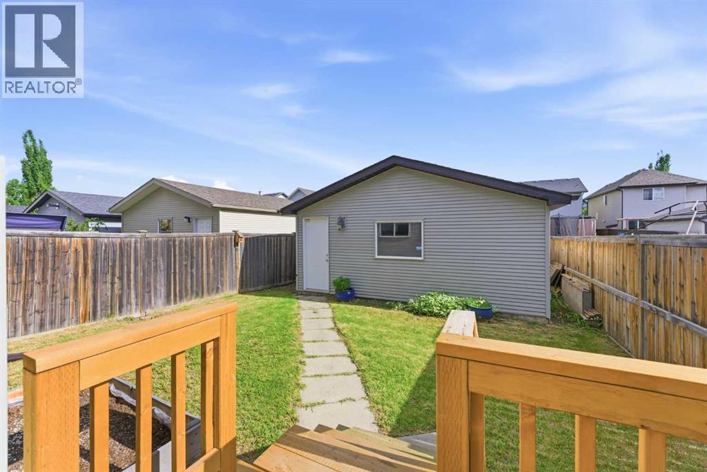 Private yard with double detached garage