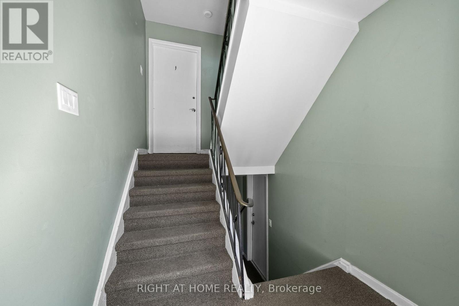 Front foyer - stairs lead to other units.