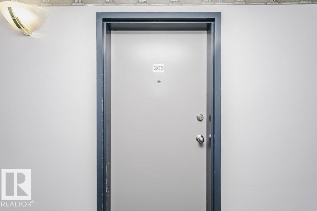 #205 9930 100 AV - 9