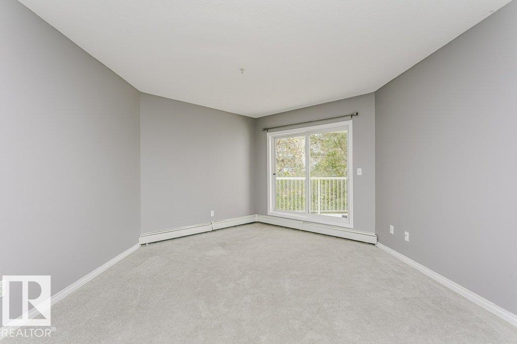 #205 9930 100 AV - 21