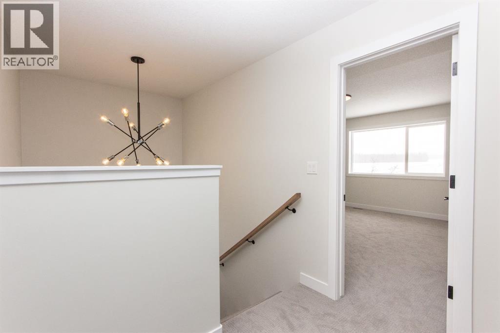 Photos and renderings are examples from a similar home built previously and do not necessarily reflect the finishes and colours used in this home