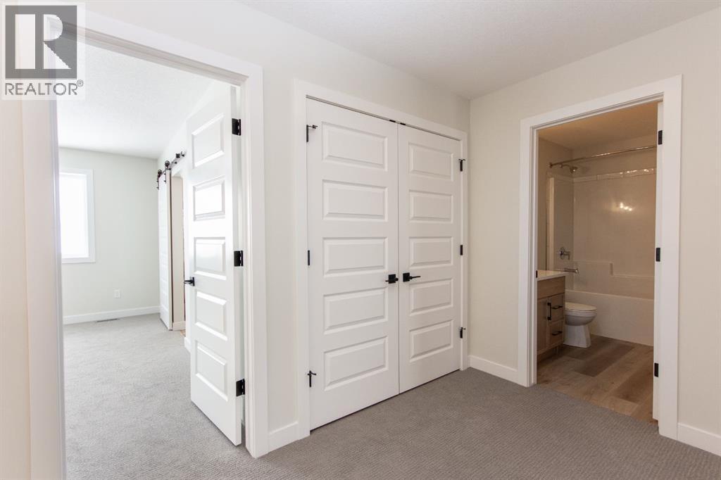 Photos and renderings are examples from a similar home built previously and do not necessarily reflect the finishes and colours used in this home