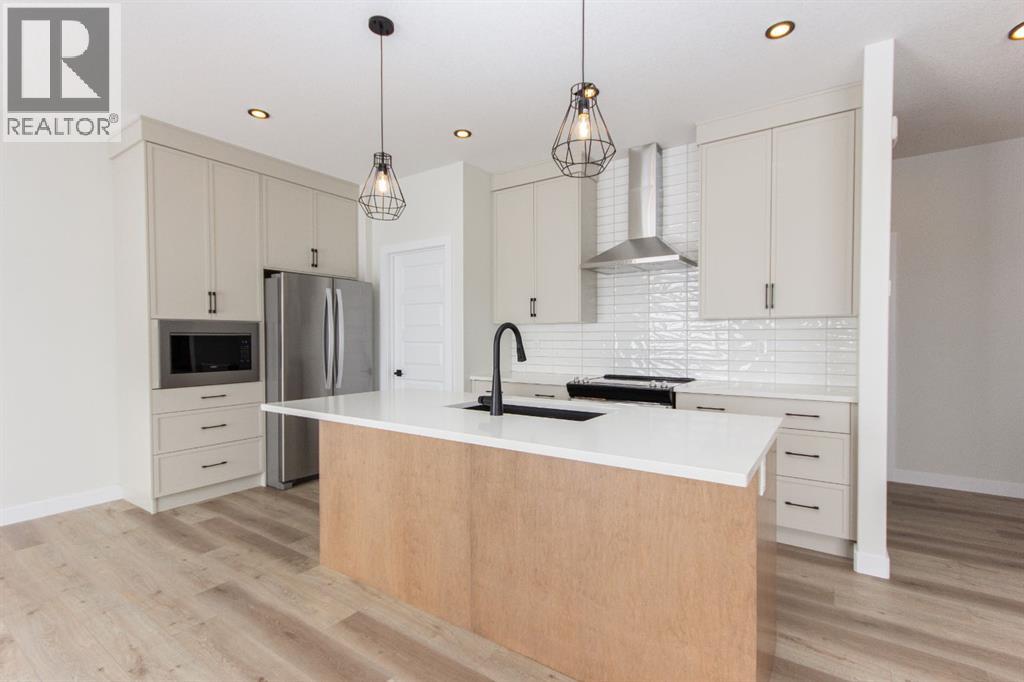 Photos and renderings are examples from a similar home built previously and do not necessarily reflect the finishes and colours used in this home