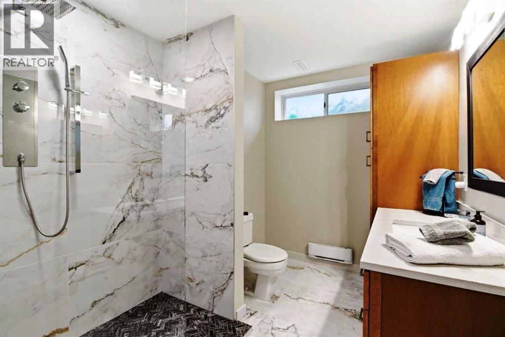 3rd full bathroom, with glass shower stall