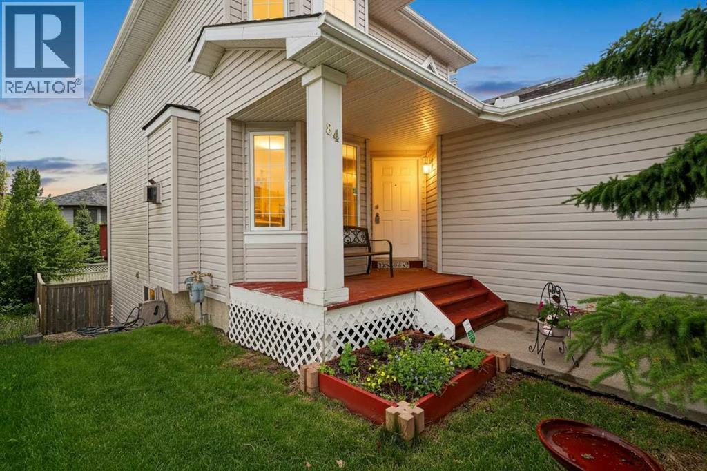 This image has been virtually altered to show a twilight setting, highlighting the home's exterior evening ambiance, lighting and finished landscaping potential