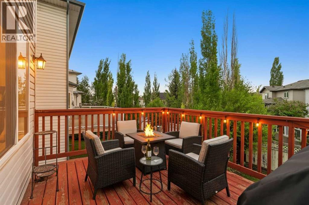 This image has been virtually altered to show a twilight setting, highlighting the home's exterior evening ambiance, lighting and finished landscaping potential