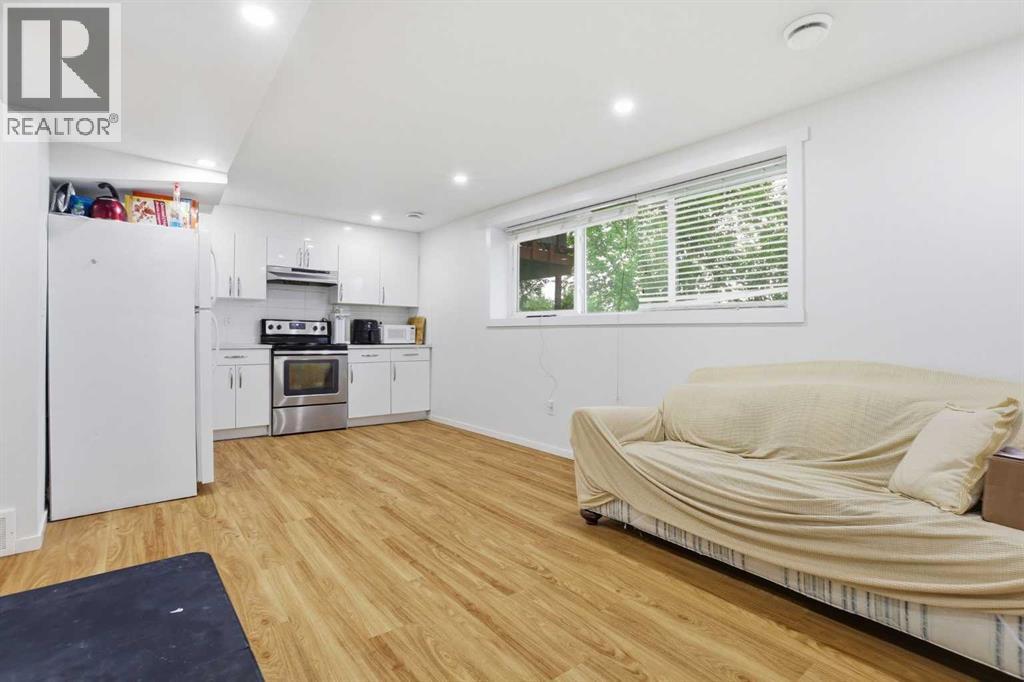 EAT IN KITCHEN AT THE REAR - room for a table and and chairs in between