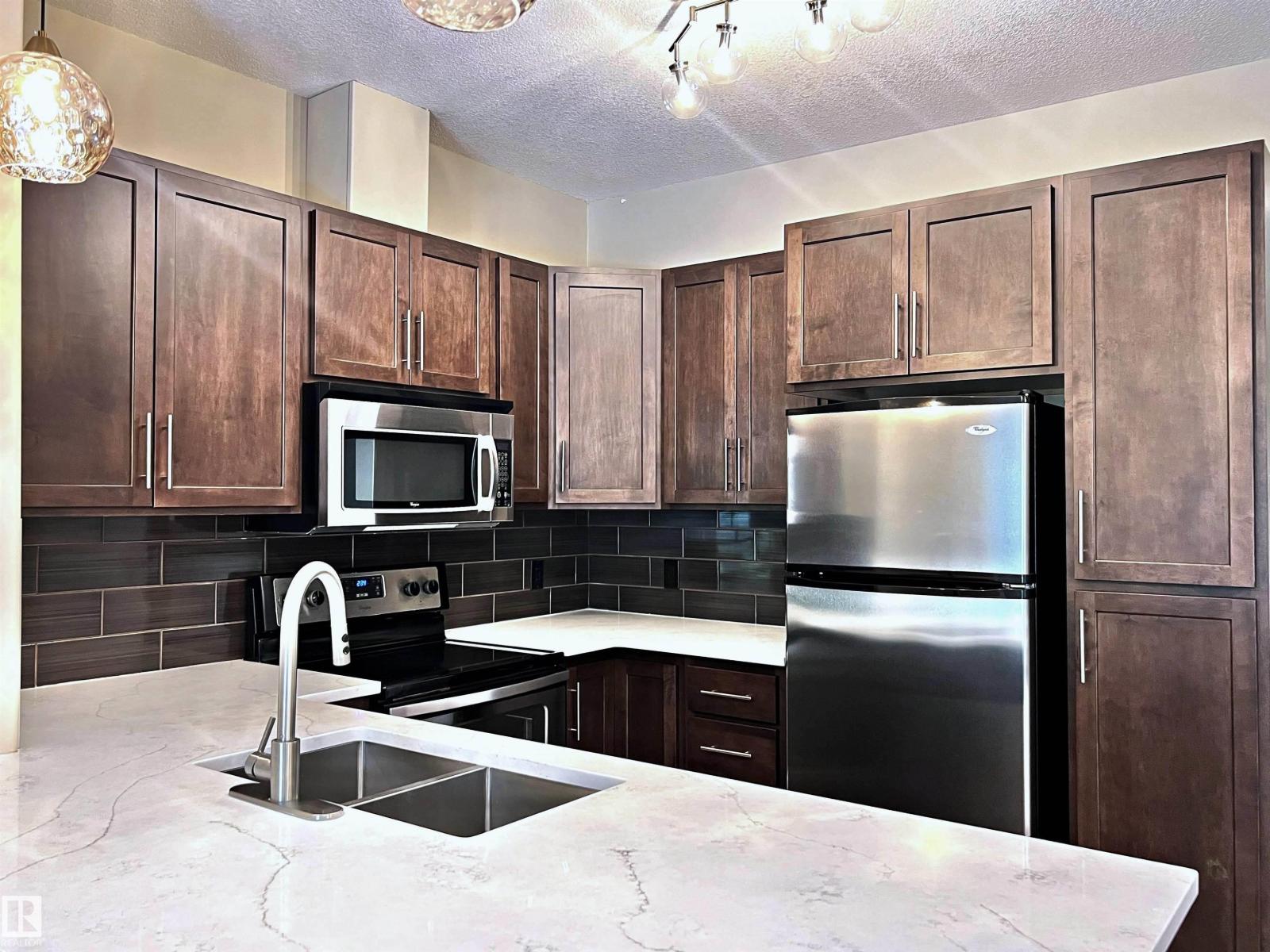 #140 308 AMBLESIDE LINK LI SW — photo 9