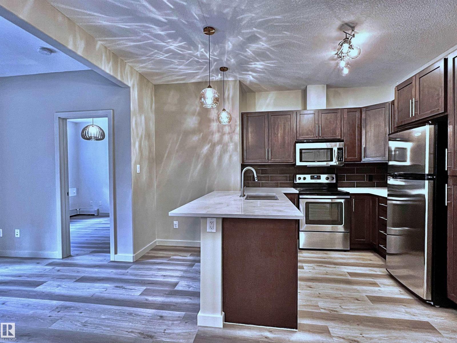 #140 308 AMBLESIDE LINK LI SW — photo 12