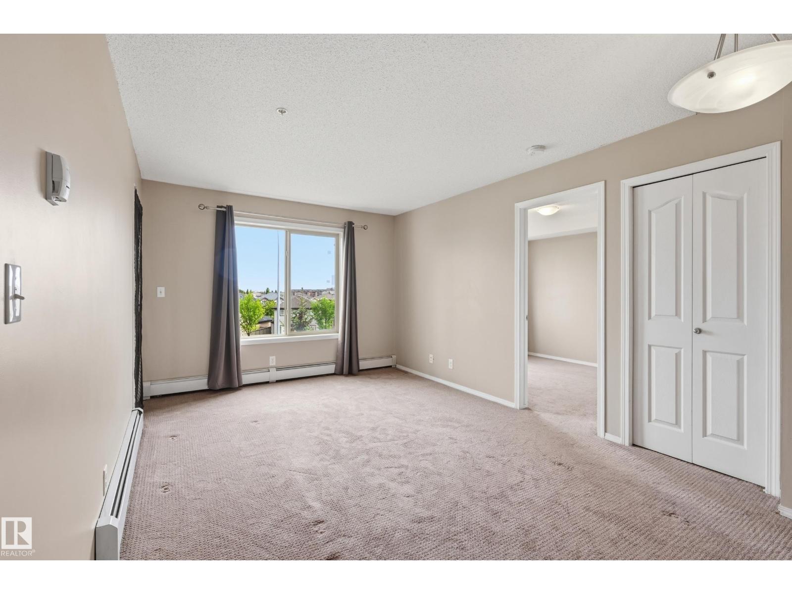 #304 11804 22 AV SW - 12