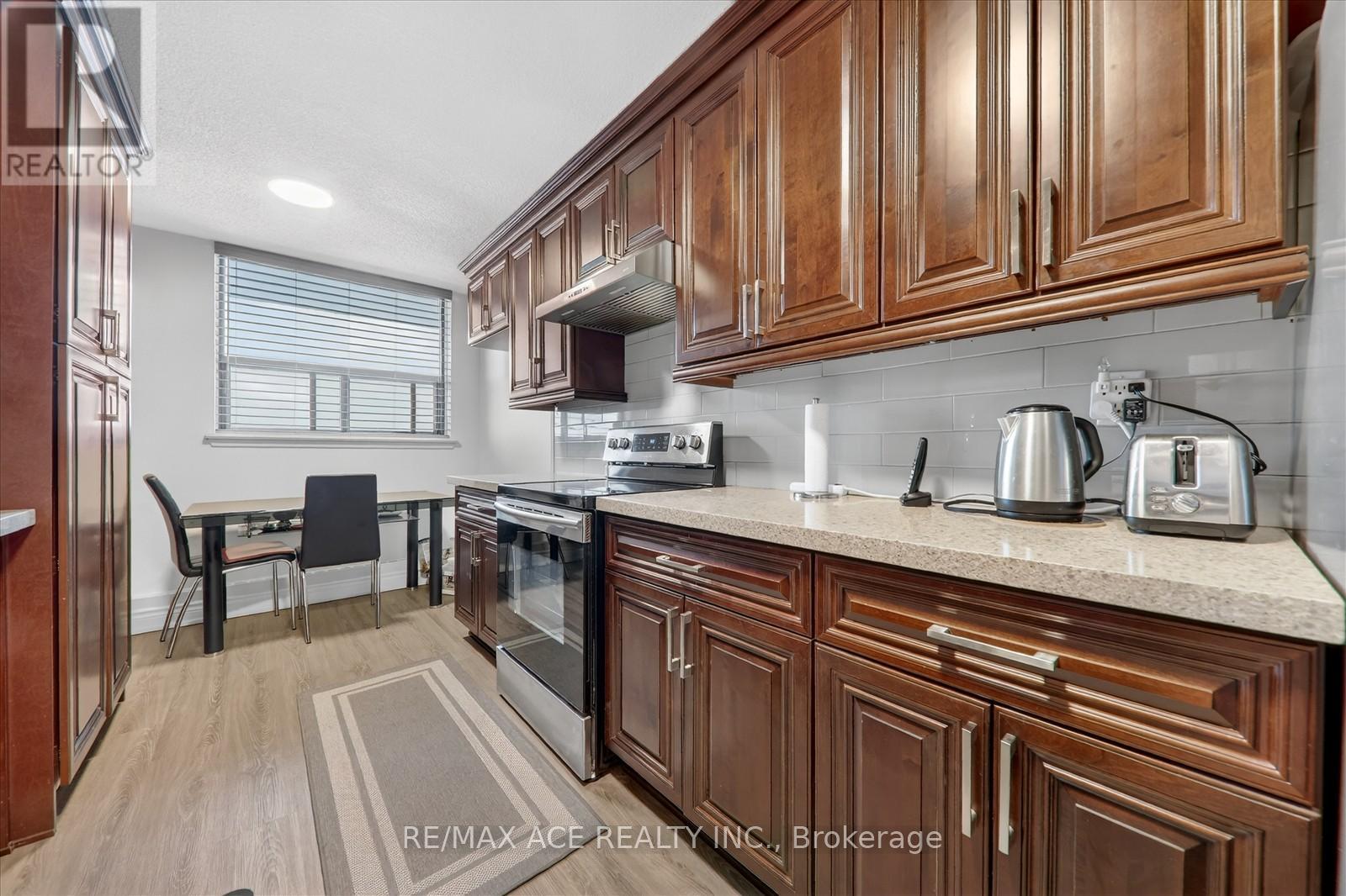 #1414 100 WINGARDEN COURT - 15