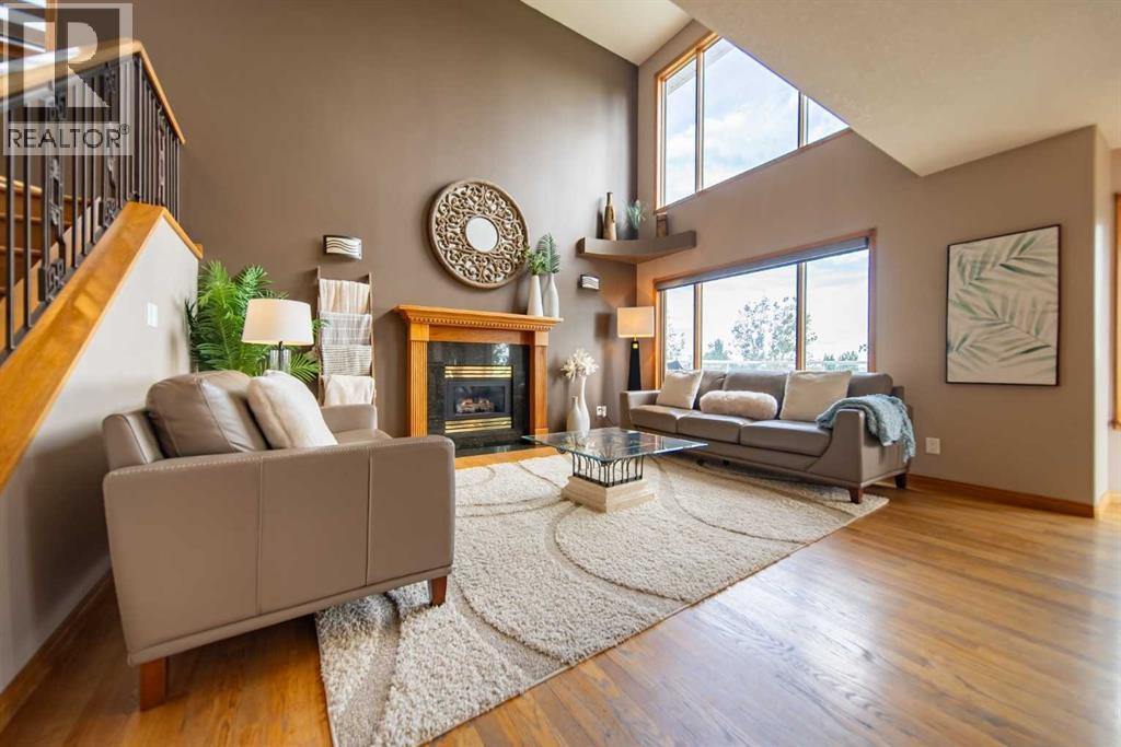 Vaulted ceilings create an airy, open feel filled with natural light