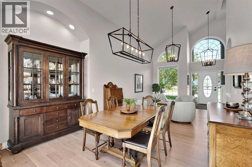 Dining and living room. Contemporary lighting throughout the home