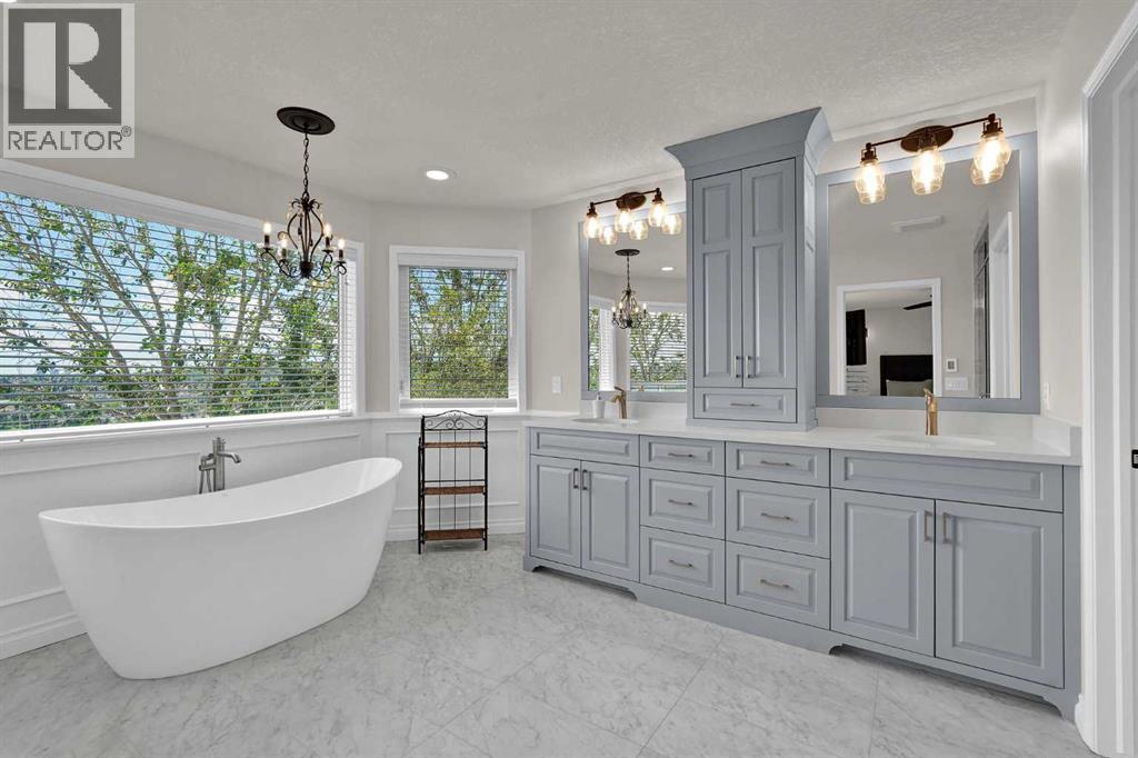 Free standing tub and dual vanities