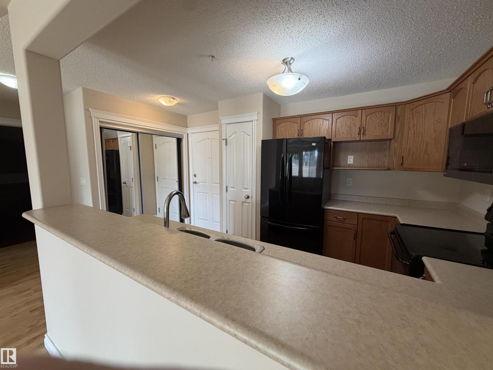 #118 7801 GOLF COURSE RD — photo 10