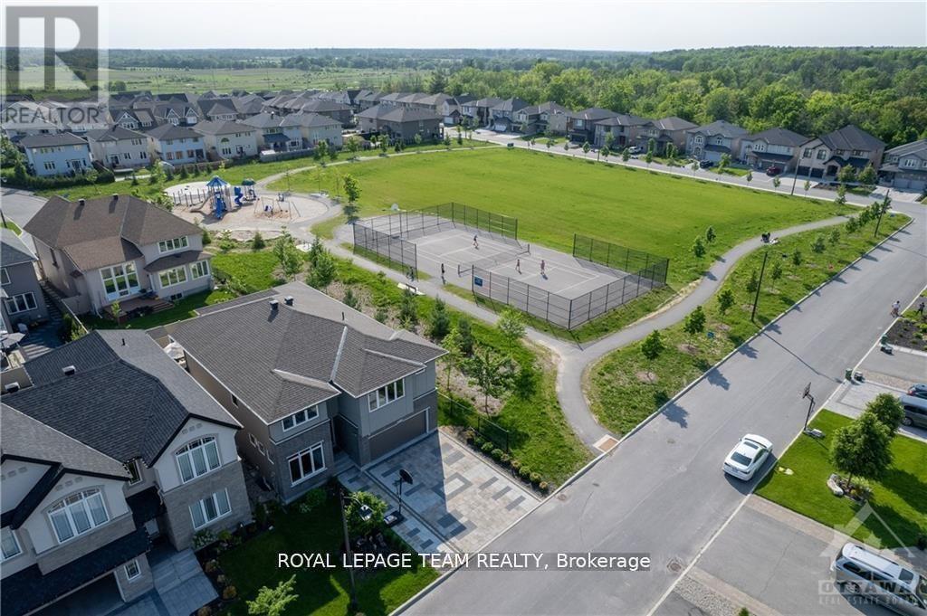 Beside a Tennis Court and Soccer Field