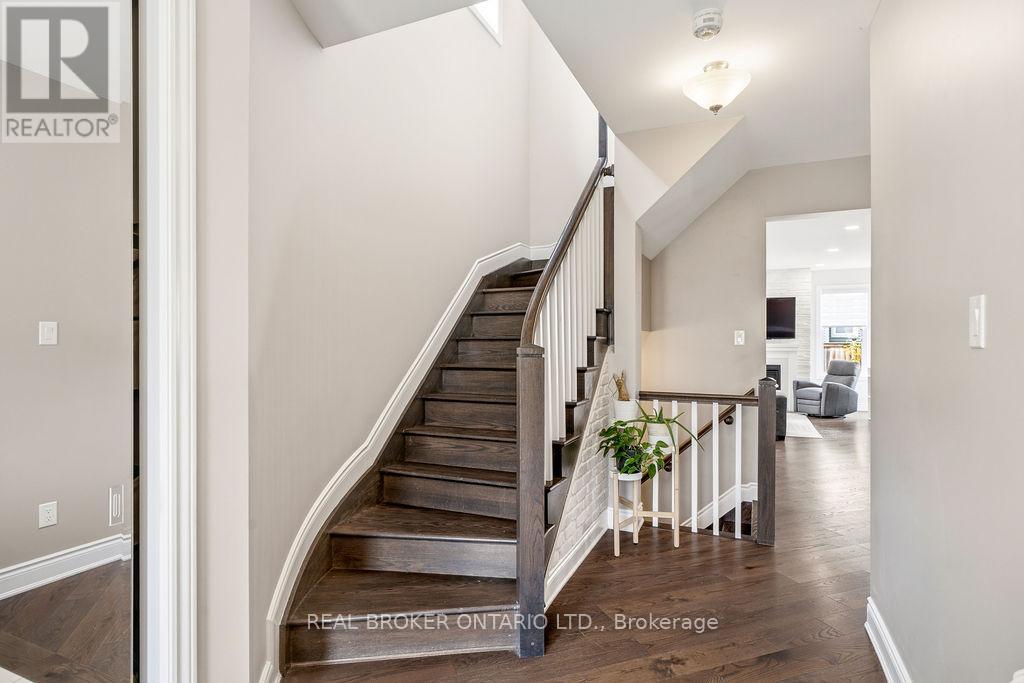 Hardwood Staircase & Wide Plank Hardwood Flooring