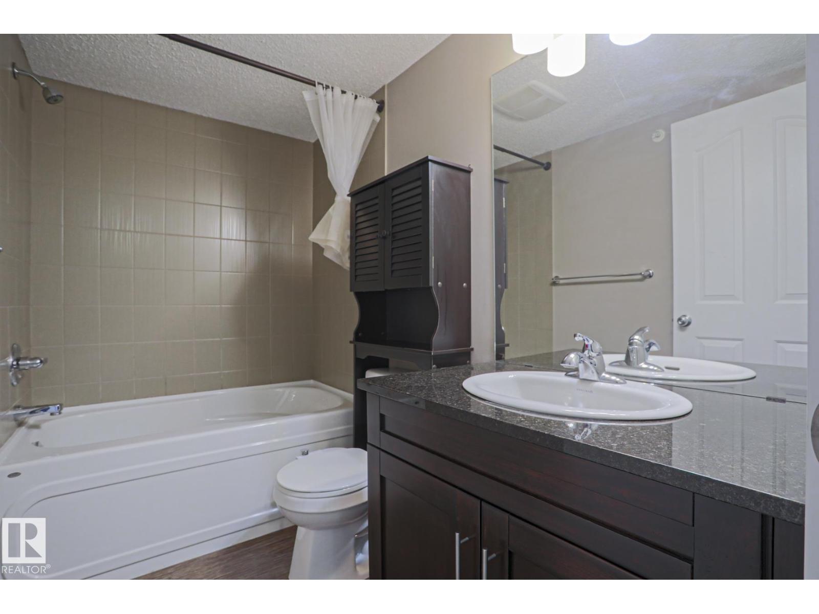 #405 11804 22 AV SW SW - 24