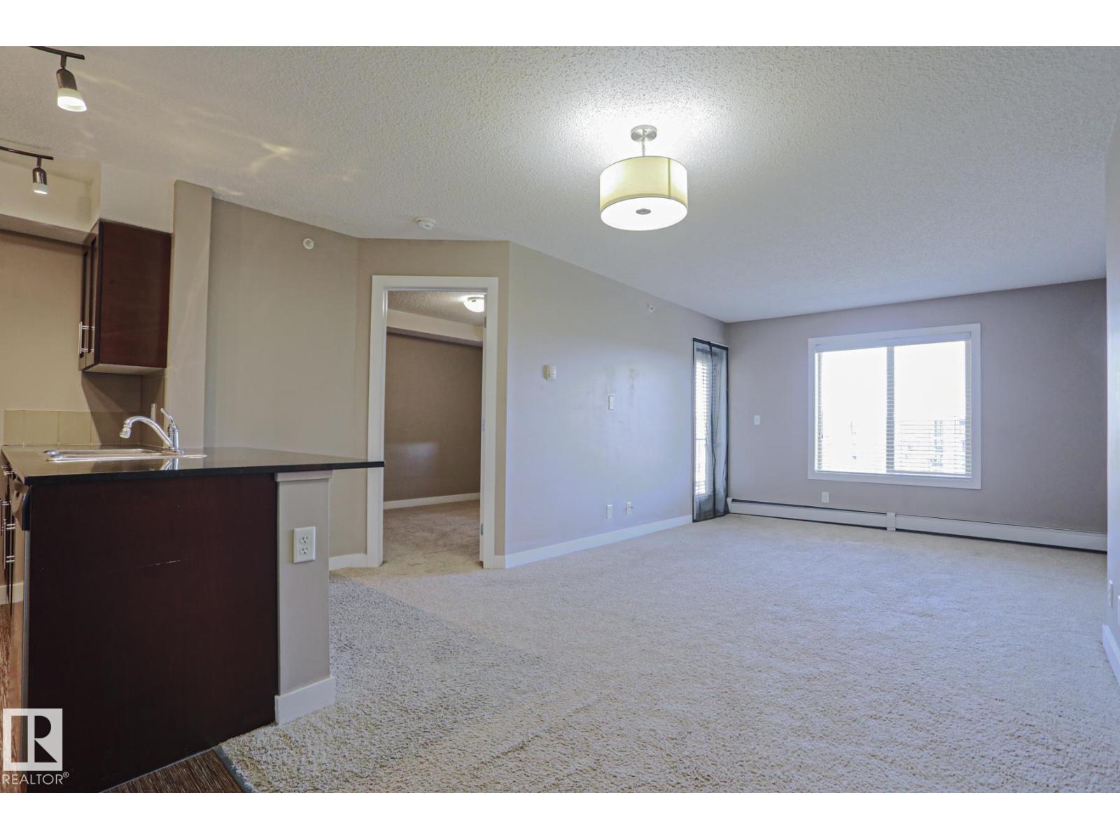 #405 11804 22 AV SW SW - 9