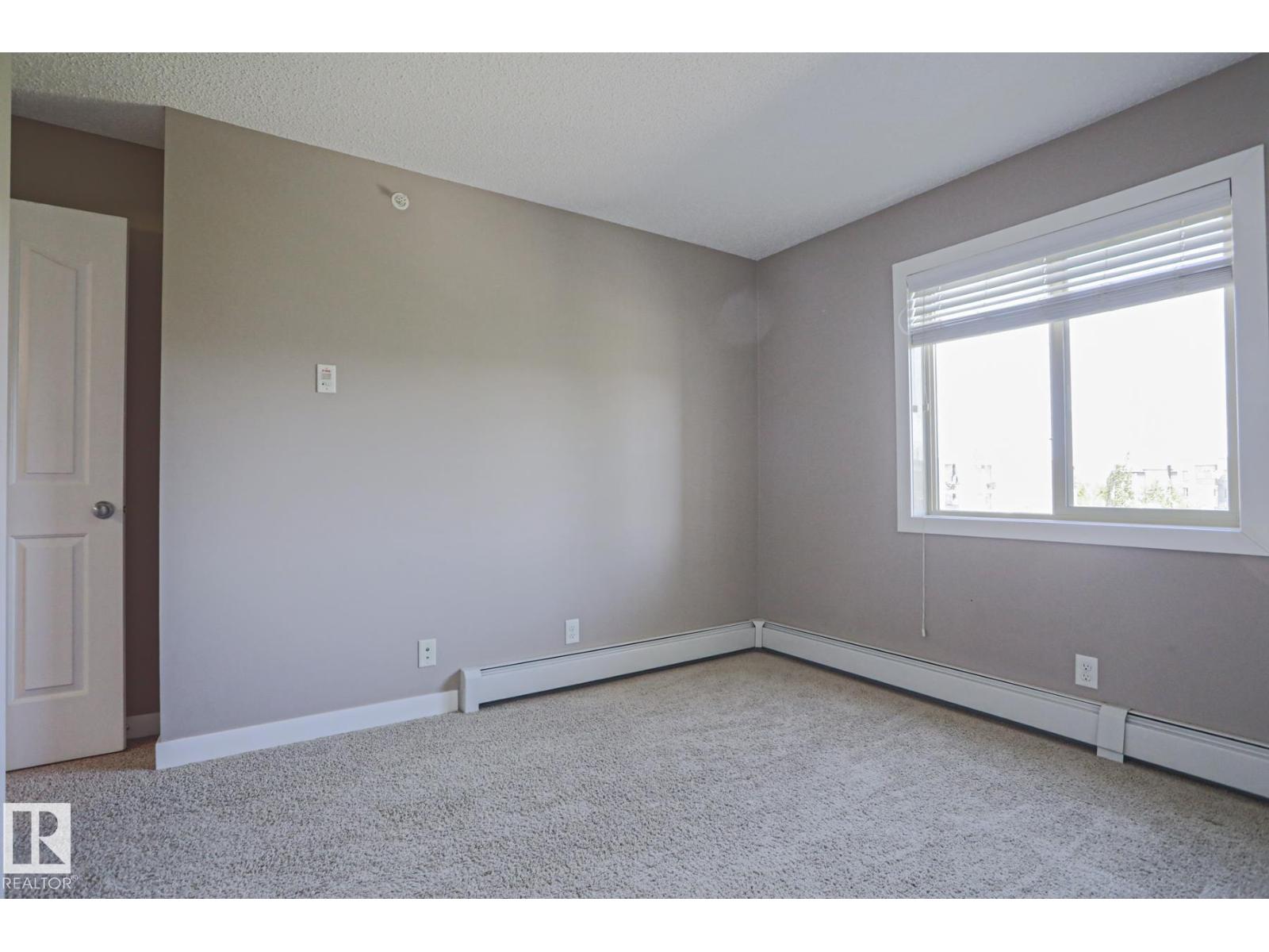 #405 11804 22 AV SW SW - 22