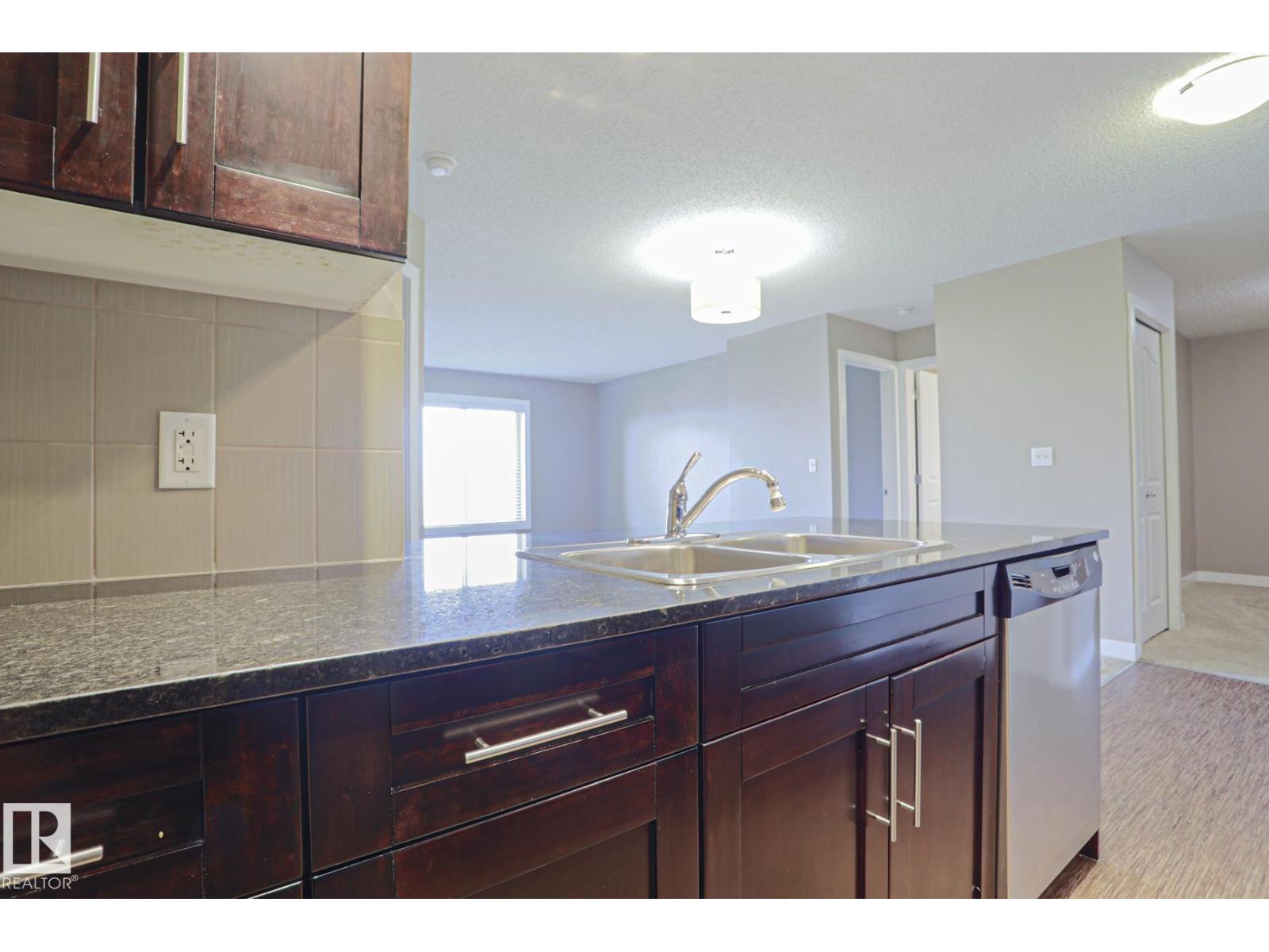 #405 11804 22 AV SW SW - 11