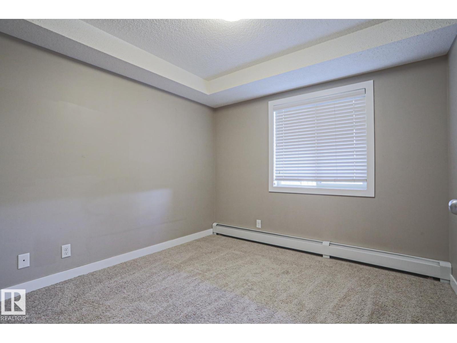 #405 11804 22 AV SW SW - 23