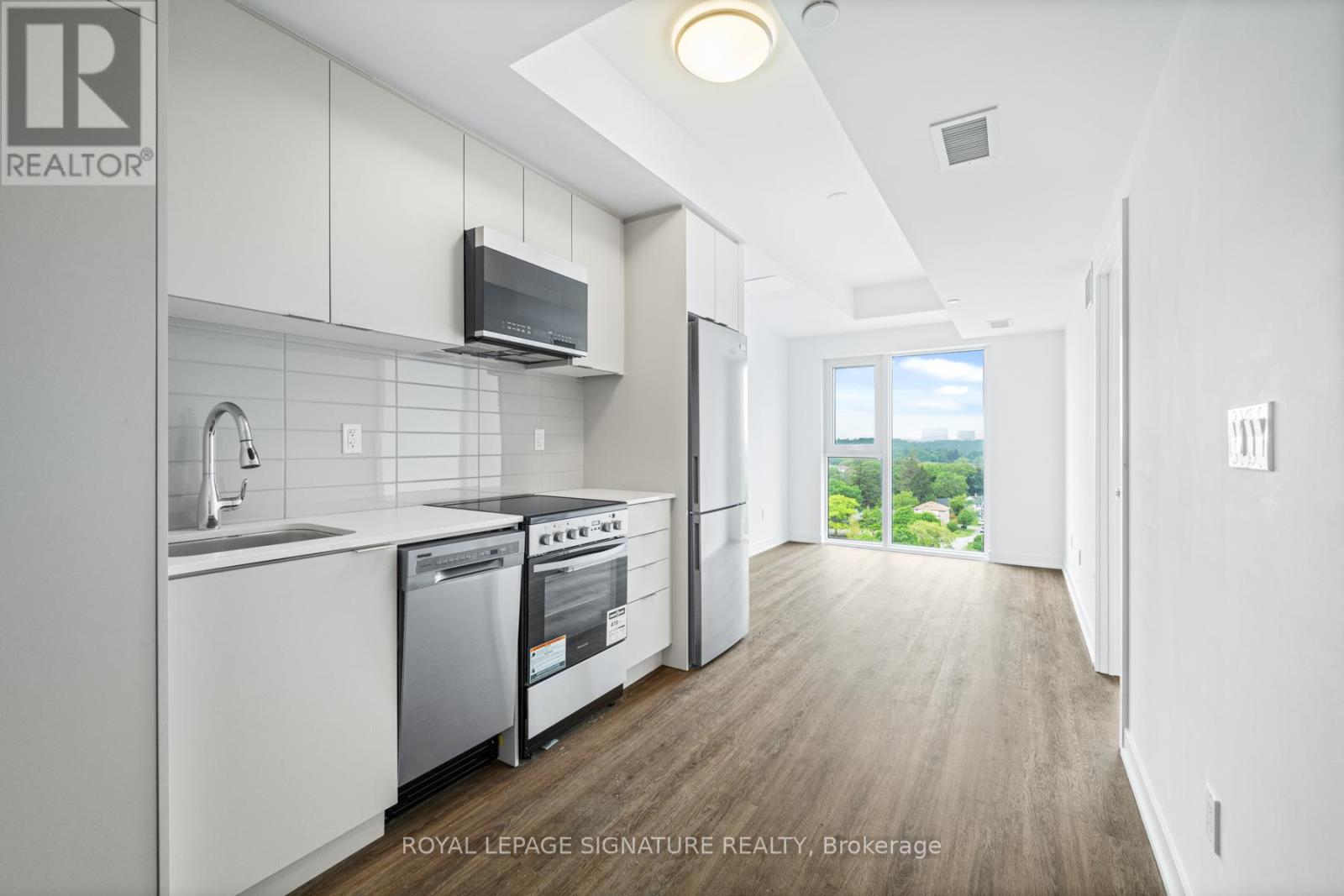 Listing photo of 1005 - 4569 KINGSTON ROAD