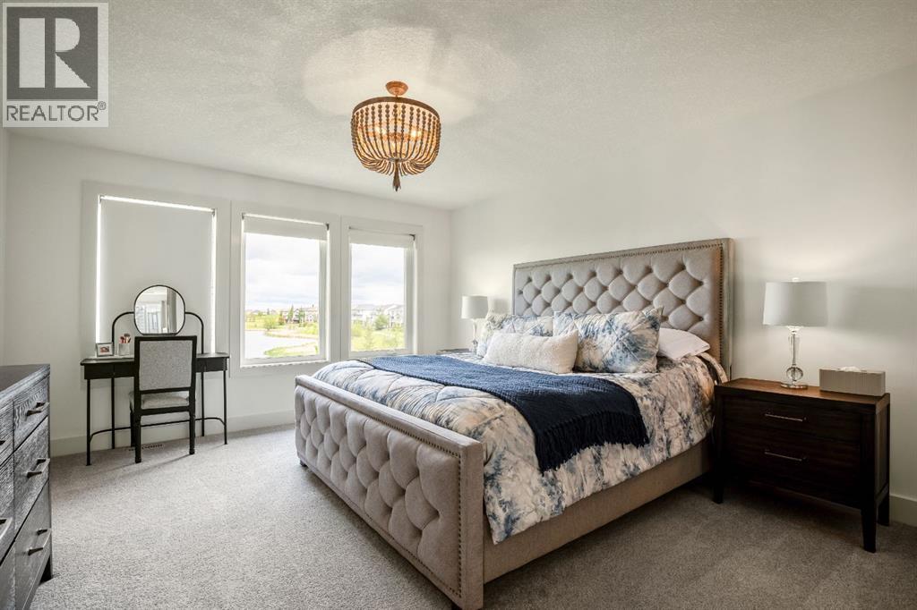 Luxurious Primary Bedroom with Water Views