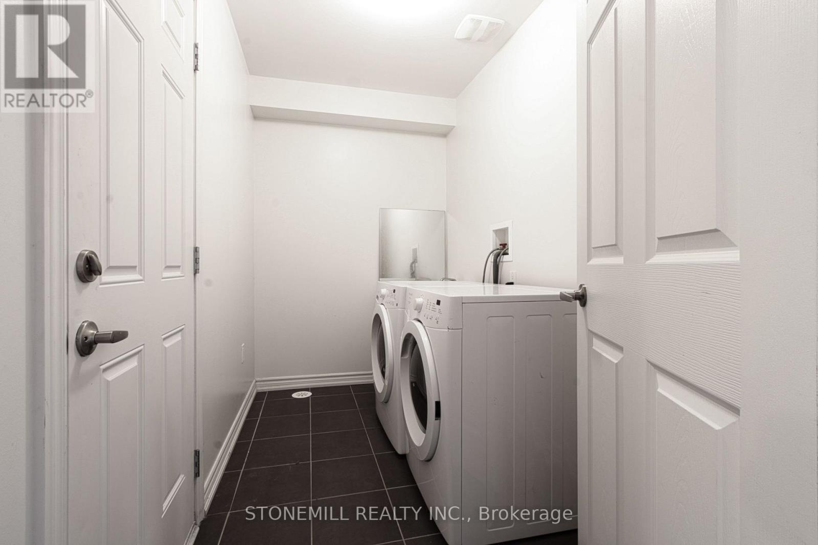 Main floor laundry/mud rom with entry from garage