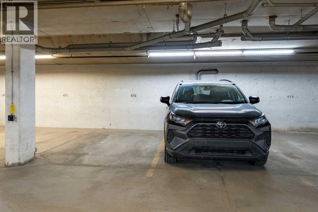 TWO titled side by side, underground parking stalls!