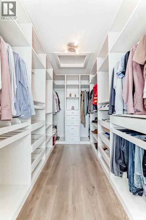 Walk In Closet with lots of Built Ins