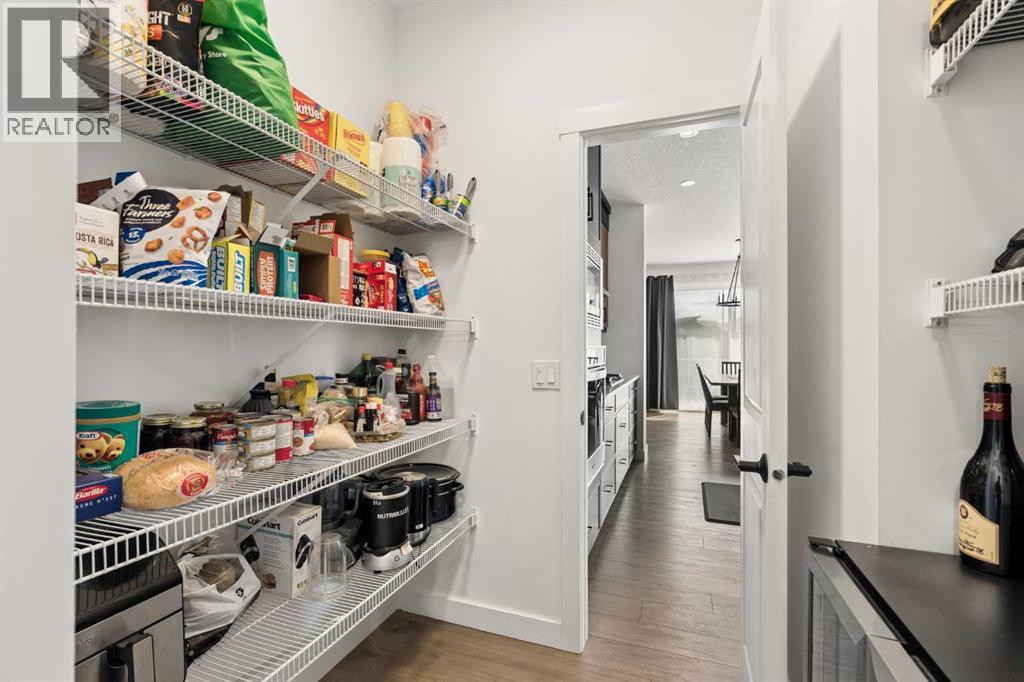 Walkthrough pantry off of the double attached garage