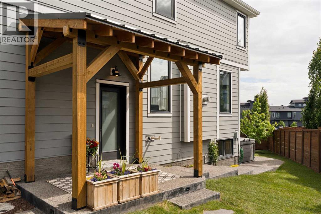 Custom pergold over the homes side entrance