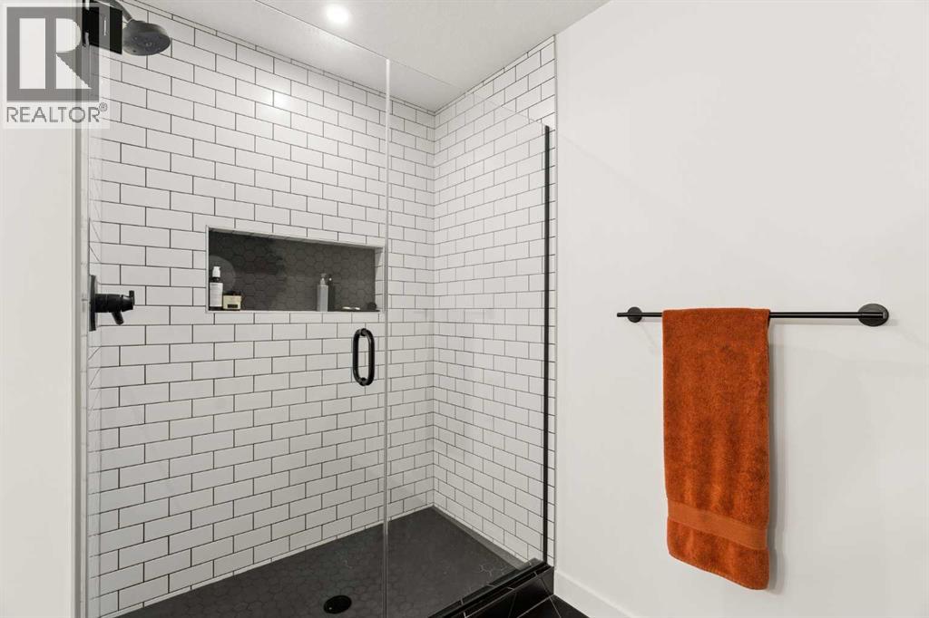 Walk-in tiled shower with 10mm glass