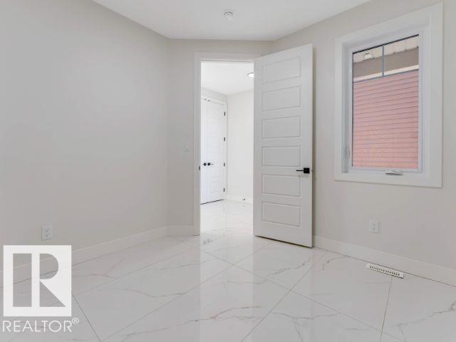 7156 177 AV NW - 6