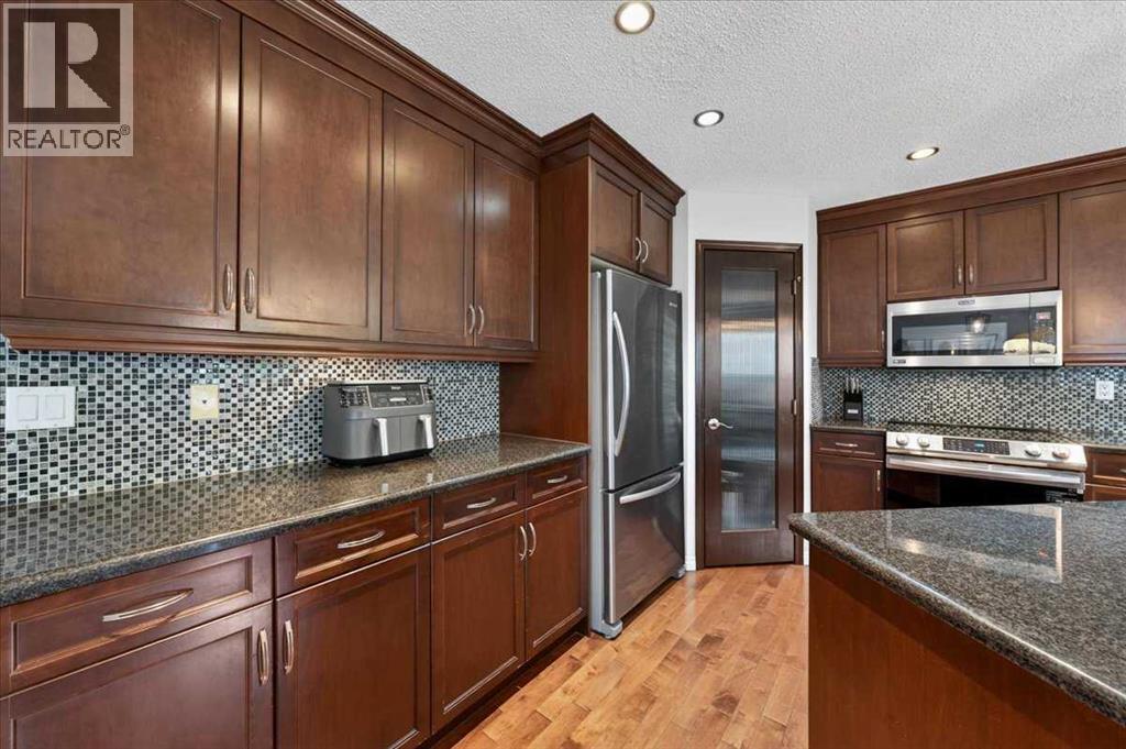 132 Tuscany Meadows Common NW — photo 11