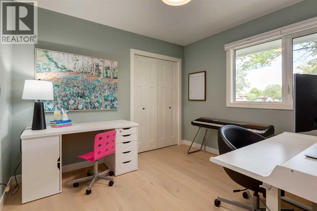 Main floor bedroom currently used as an office